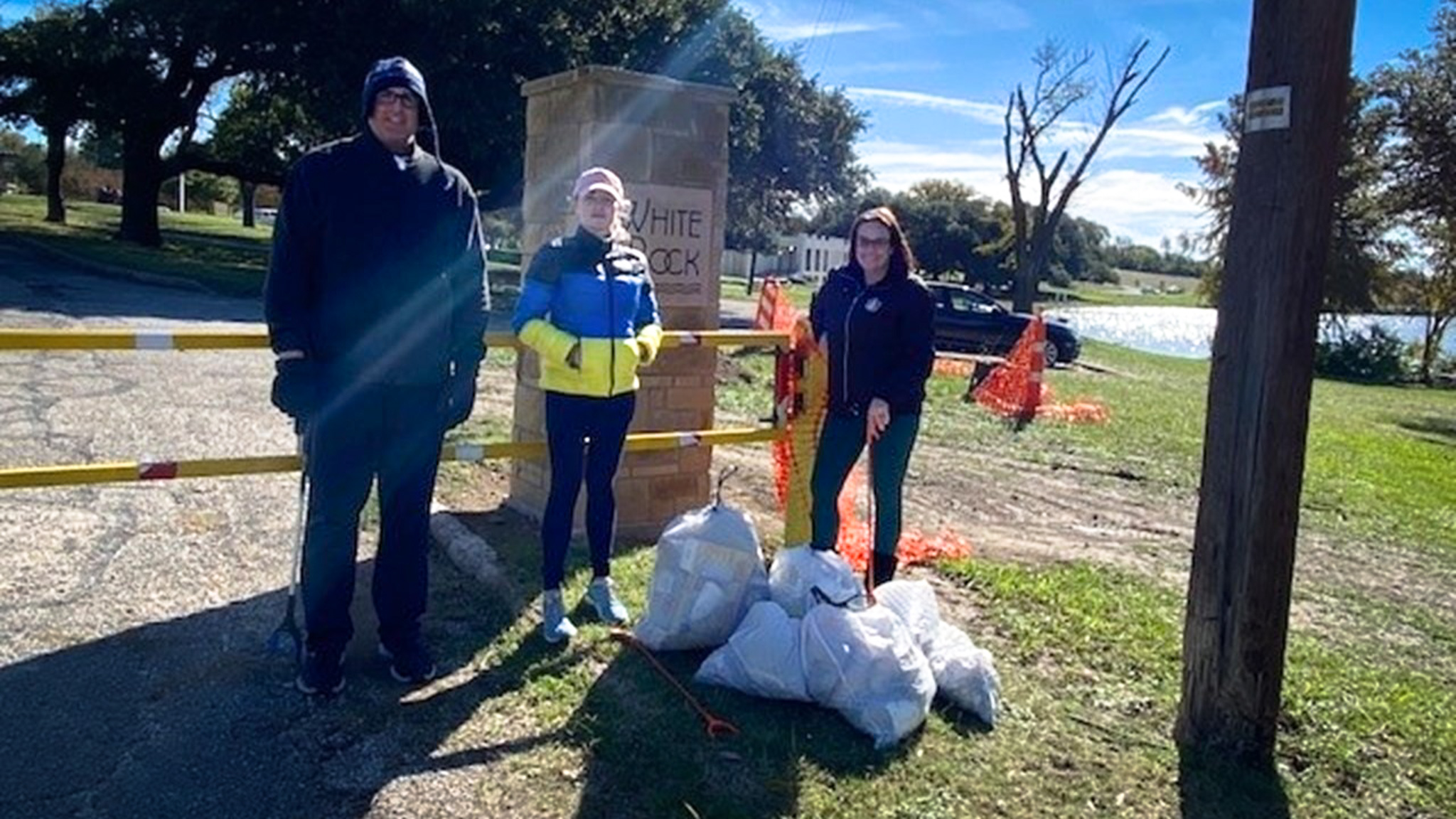 Halff's Richardson employees braved the cold to clean up trash at White Rock Lake. 