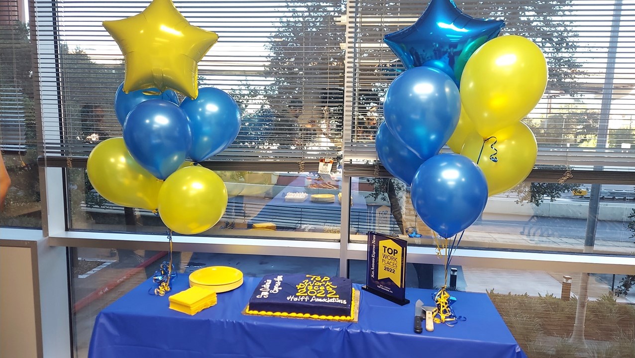 Halff's San Antonio office celebrated the Top Workplaces award with cake, balloons and more!