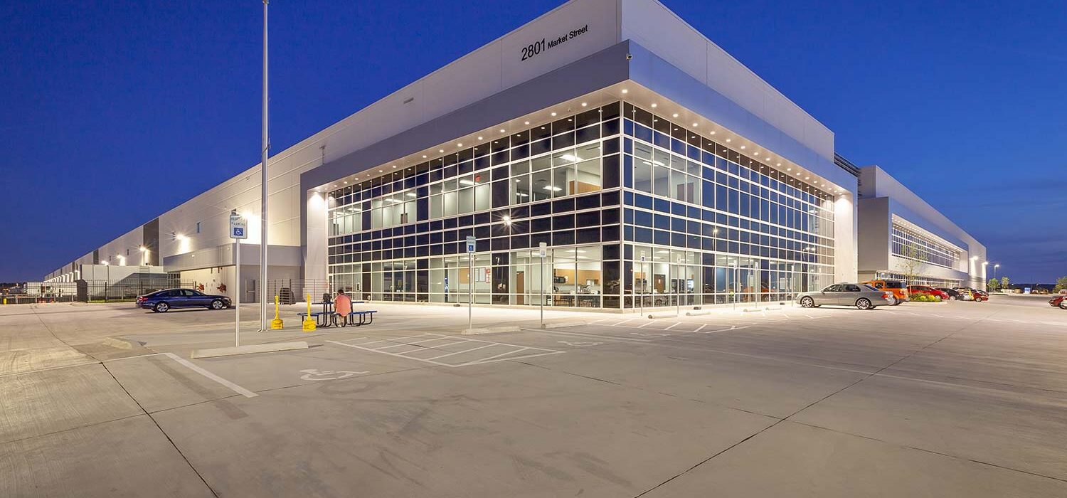 Project Pedregal building at night with lights exterior view