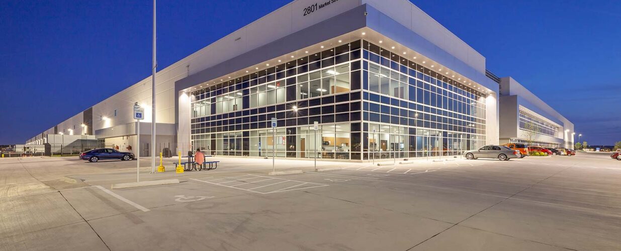 Project Pedregal building at night with lights exterior view