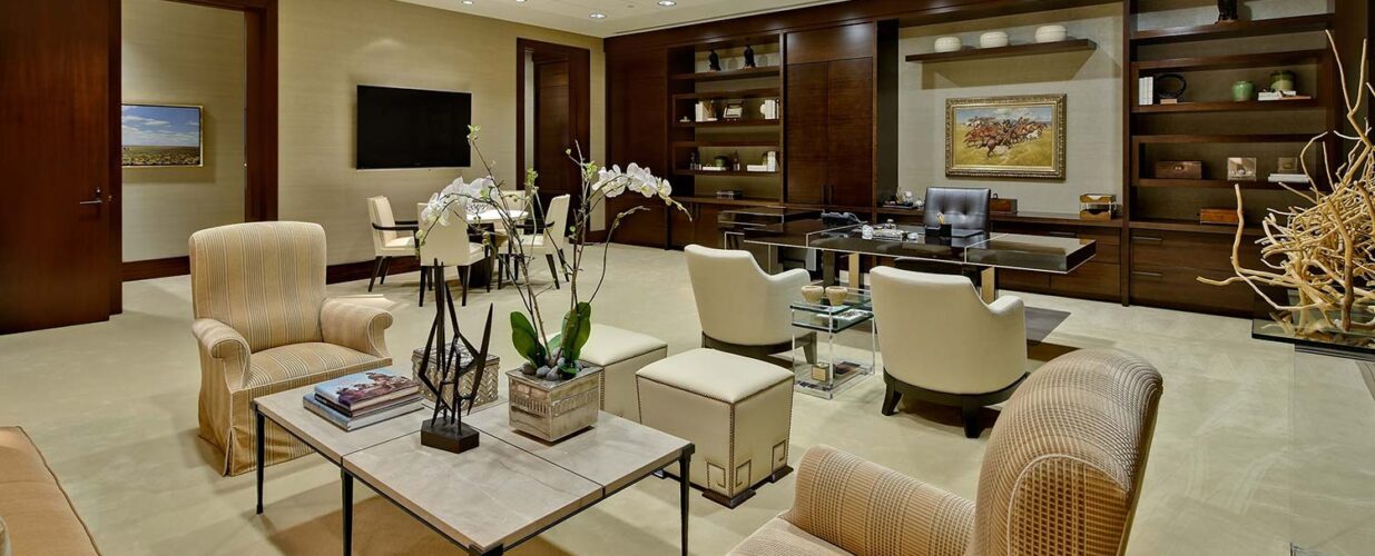 business lounge with armchairs at Ben E Keith executive office