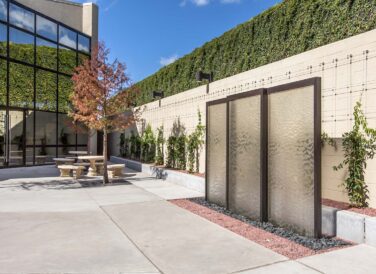 outdoor waterfall feature at Ben E Keith office