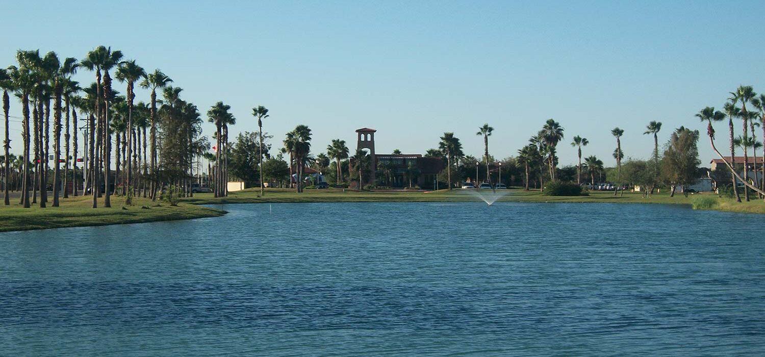 water view of South Belton with palm trees
