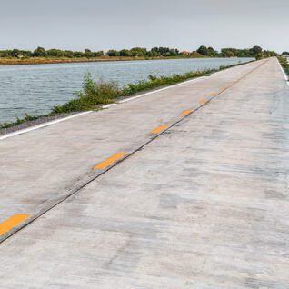 road running through water requiring section 404 permitting