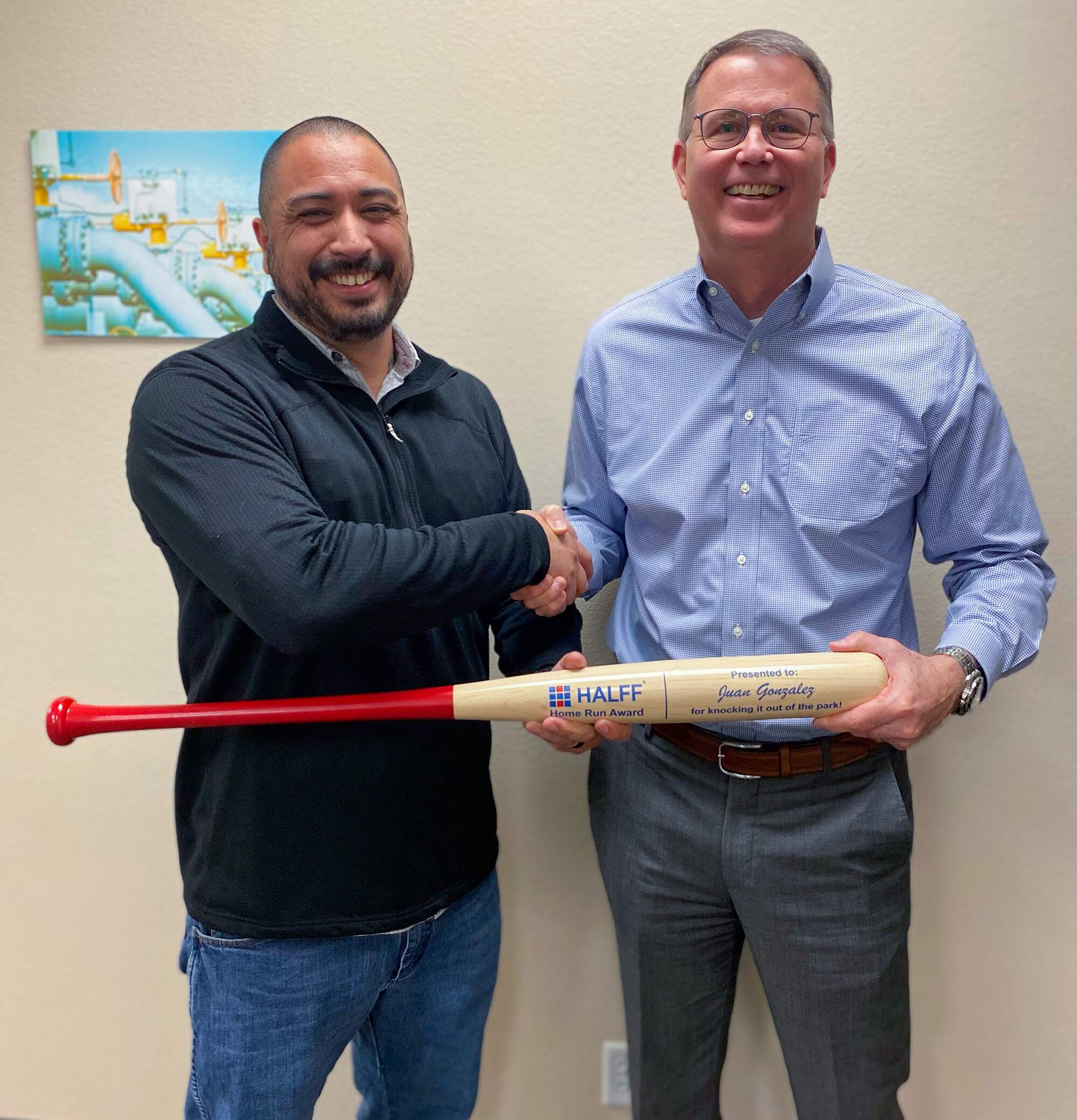 Halff President Mark Edwards giving home run award to Juan Gonzalez