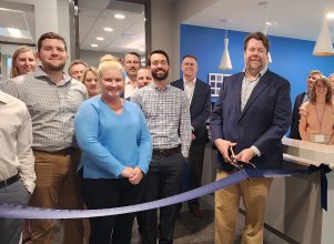 Halff Jacksonville employees cutting ribbon for new office opening