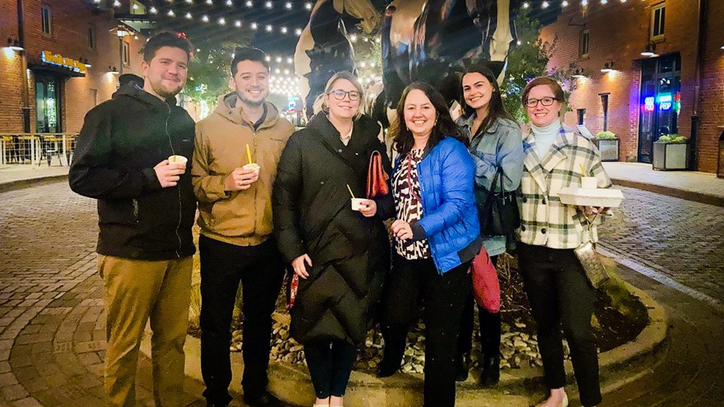 Halff's Planning and Landscape Architecture teams enjoying team bonding time over ice cream at the Fort Worth Stockyards