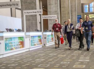 Environmental Trade Fair attendees walking in lobby