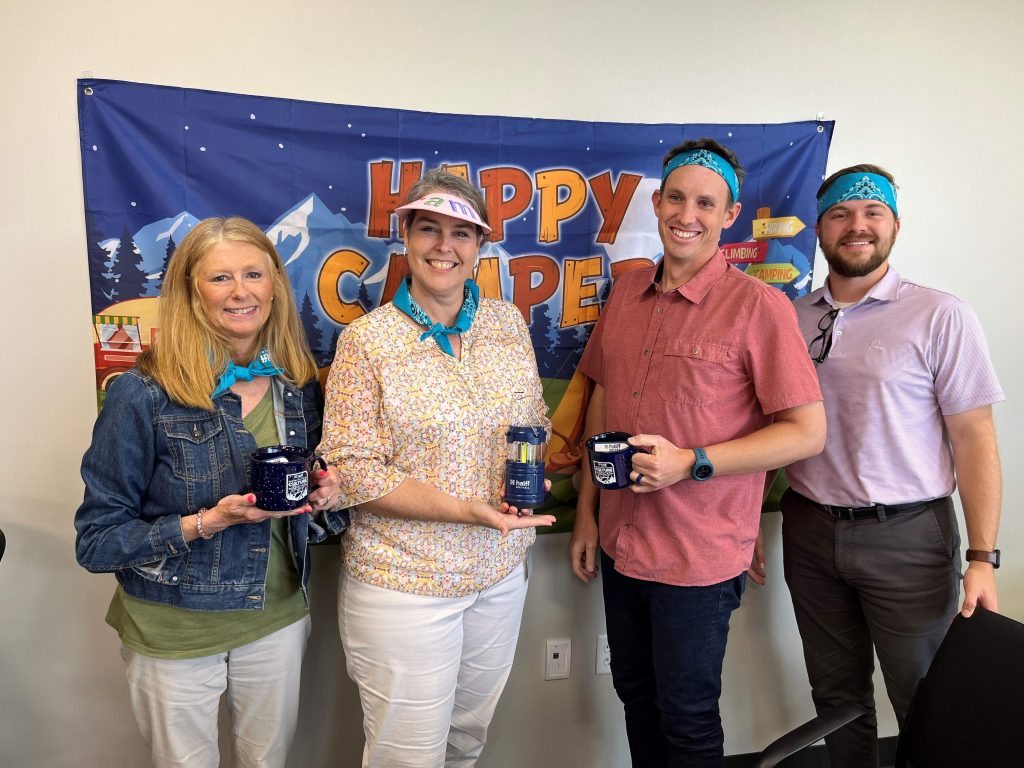 Halff employees from Little Rock and North Little Rock, Arkansas offices after culture camp with prizes in hand