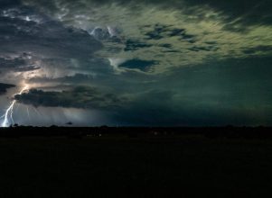Lighting across a night sky horizon in Norman Oklahoma