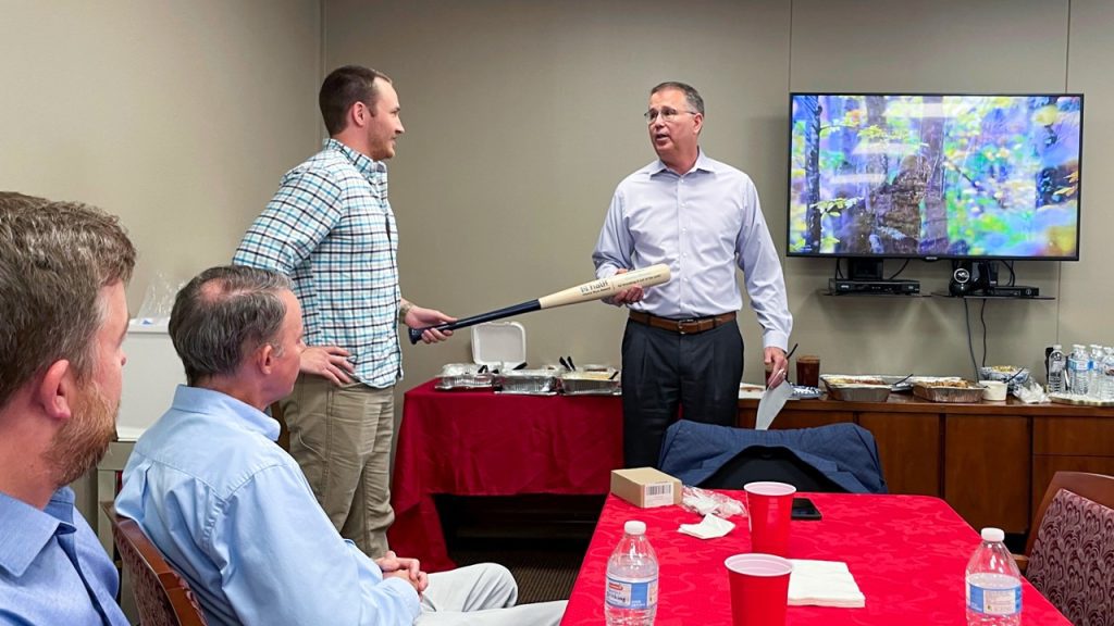 Halff CEO Mark Edwards presenting the Halff Home Run Award to Victor Bivens in Shreveport