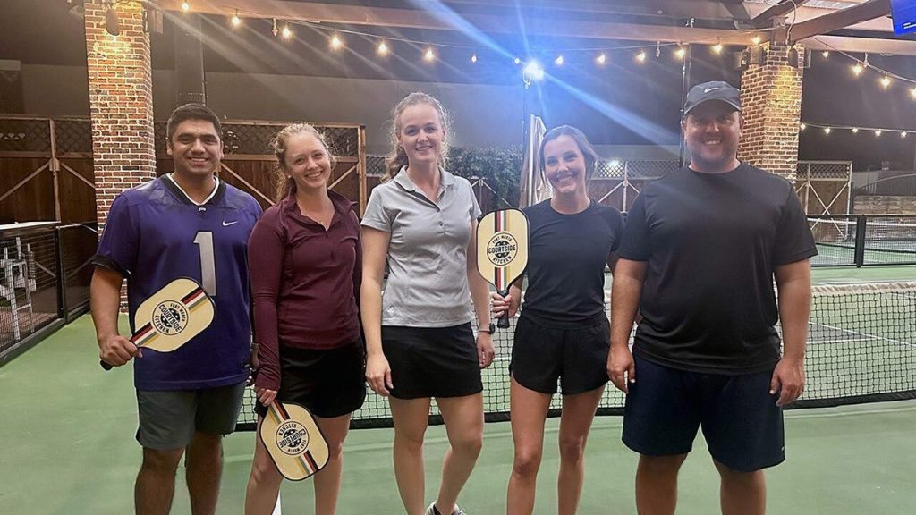 Halff Fort Worth team playing pickleball at Courtside Kitchen
