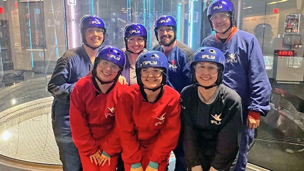 Communications team at Halff going skydiving together for team building activity