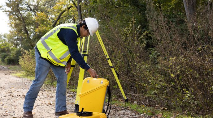 Halff surveyor setting up survey and lidar equipment